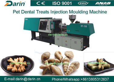 Os dentes dos cuidados dentários limpam o equipamento de fabricação do alimento para cães/máquina de molde