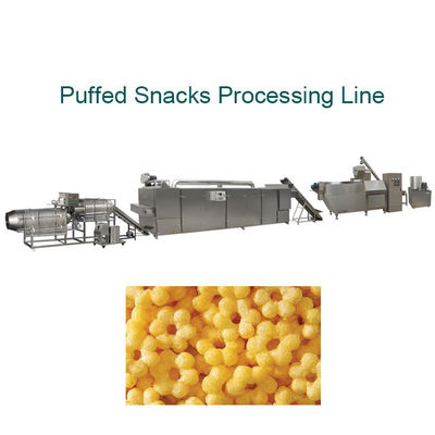 A bola dá forma à máquina dos petiscos do sopro do milho