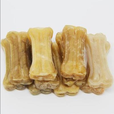 o cão de 15 polegadas que mastiga petiscos pressionou os ossos do couro cru da máquina que fazem a máquina