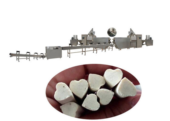 O cão da produção de alimentos para animais de estimação dos cuidados dentários trata/o processamento dos petiscos do animal de estimação pastilha elástica do cão