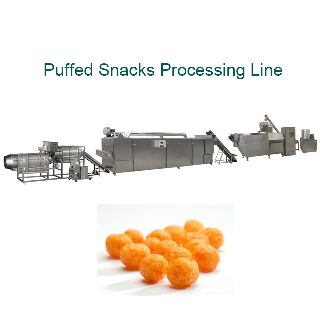 A bola dá forma à máquina dos petiscos do sopro do milho